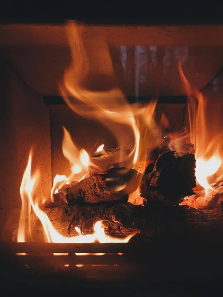 Flames burning cleanly in a serviced fireplace insert